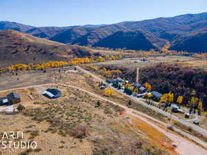 Drone / aerial view featuring a mountain view