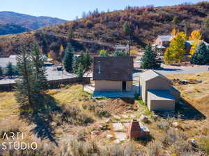 Drone / aerial view featuring a mountain view