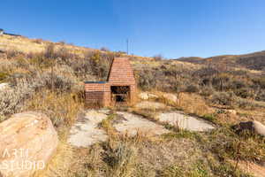 Quaint outdoor fireplace! Wouldn't this be a great place for a gazebo?