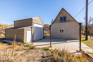 Exterior space with an outbuilding