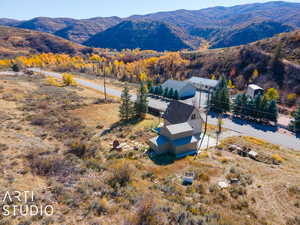 Drone / aerial view featuring a mountain view