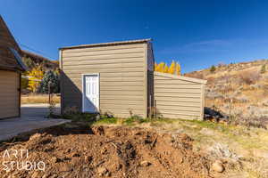 View of outbuilding featuring a mountain view