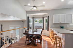 Dining space featuring light hardwood / wood-style floors, a textured ceiling, and ceiling fan