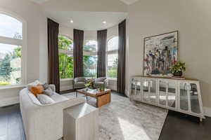 Living area featuring wood-type flooring and a wealth of natural light