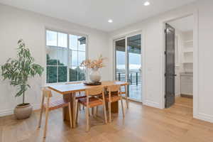 Dining space featuring light wood-type flooring