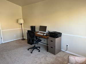 Office featuring light colored carpet