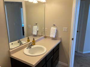 Bathroom featuring vanity