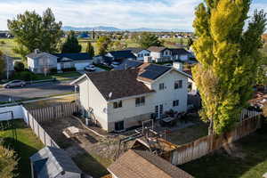 Birds eye view of property with a mountain view