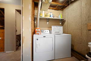 Clothes washing area with washing machine and dryer