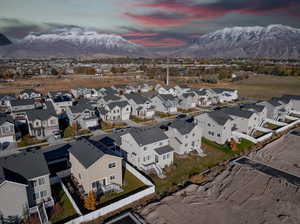 Aerial view at dusk featuring a mountain view