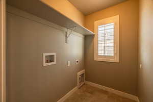 Laundry room featuring hookup for an electric dryer and washer hookup