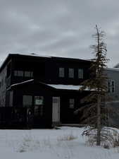 View of snow covered property