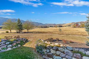 Community Own land open space behind home with views of mountains  from back deck