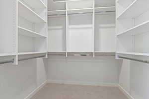 Spacious walk-in closet with adjustable shelving