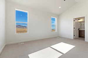 Primary Suite with vaulted ceilings
