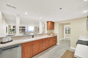 Gallery kitchen with South facing Mountain View. New LG appliances (all included), new kitchen cabinetry, new granite countertops.  Tile flooring.