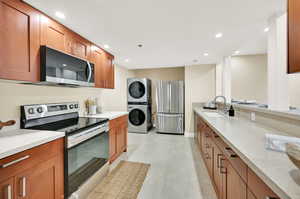 Gallery kitchen with new LG appliances all included.  New cabinetry, new granite countertops.  Tile flooring.