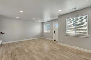 Interior space with light hardwood / wood-style flooring