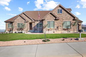 View of front of house with a front lawn