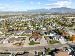 Birds eye view of property with a mountain view