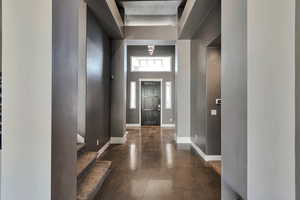 Foyer entrance with a towering ceiling