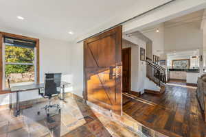 Office area featuring sink and dark hardwood / wood-style floors