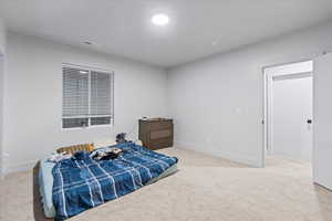 View of carpeted bedroom