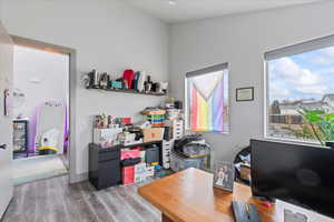 Home office featuring wood-type flooring