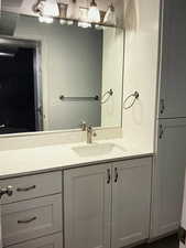 Basement Bathroom featuring vanity