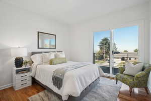 Bedroom 2 upstairs with west city views and balcony