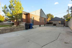 Exterior space featuring a driveway and ample parking space