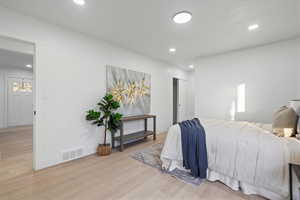 Bedroom featuring light hardwood / wood-style flooring