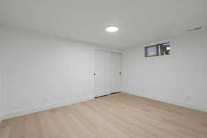 Bedroom with light wood-type flooring