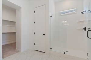 Owners Bathroom featuring a shower with Euro Glass Door