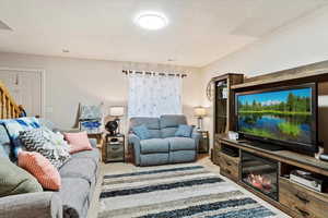 Living room featuring light colored carpet