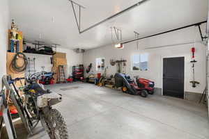 Garage featuring a garage door opener