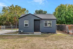 View of front facade featuring a front yard and new paint