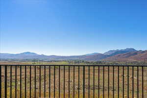 Property view of mountains with a rural view