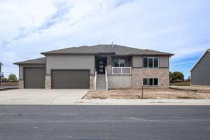 Prairie-style home with a garage