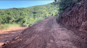 View of landscape driving up to the property