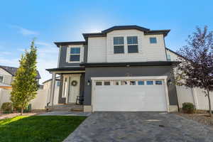 Front of property featuring a garage