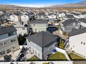 Birds eye view of property with a mountain view