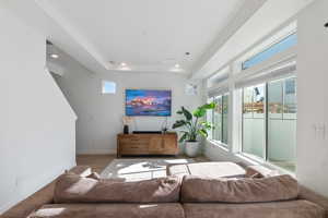 Living room with hardwood / wood-style flooring