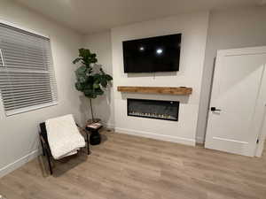 Sitting room featuring light hardwood / wood-style flooring