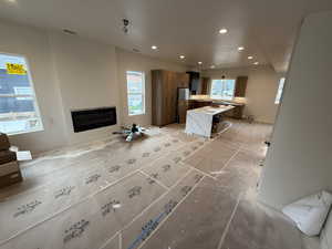 Kitchen with a center island and plenty of natural light