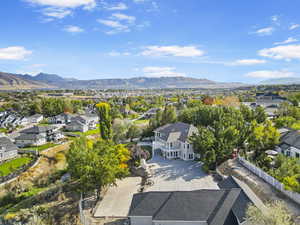 Birds eye view of property featuring a mountain view