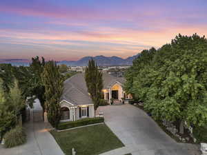 View of front facade featuring a yard and a mountain view