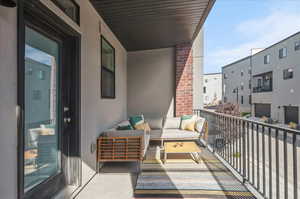 Balcony featuring an outdoor living space