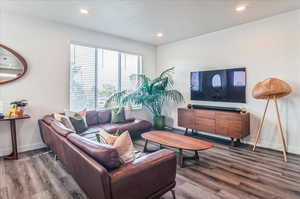 Living room featuring hardwood / wood-style flooring