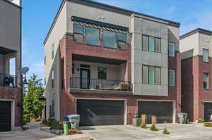 View of property featuring a garage